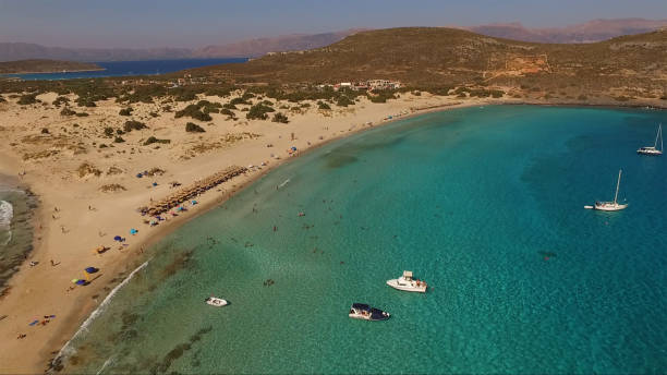 Aerial drone photo of iconic beach of Simos with turquoise waters, Elafonisos island, South Peloponnese, Greece stock photo