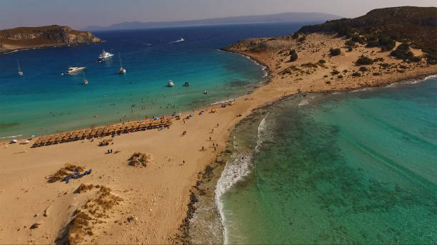 Aerial drone photo of iconic beach of Simos with turquoise waters, Elafonisos island, South Peloponnese, Greece stock photo
