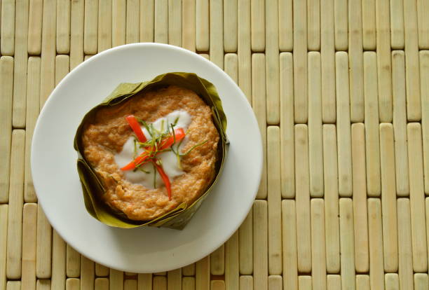 istock steamed fish with curry paste stuffed Indian mulberry 694402150