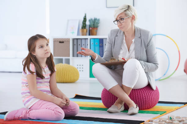 istock Bored girl attending therapy session 694402998