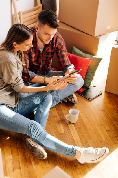 istock Young man helping his friend 694429458