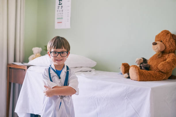 Cropped shot of an adorable little boy dressed as a doctor