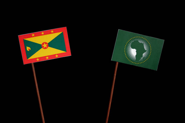 istock Grenada flag with African Union flag isolated on black background 694438260