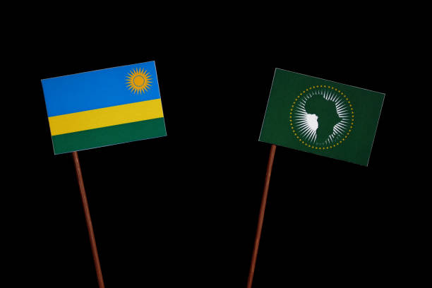 istock Rwanda flag with African Union flag isolated on black background 694443638