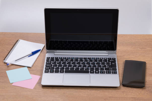 istock Neat workstation in an office with laptop 694444142