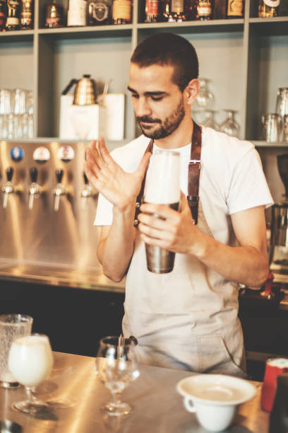 istock Professional barista making coffee in cafe bar 694447658