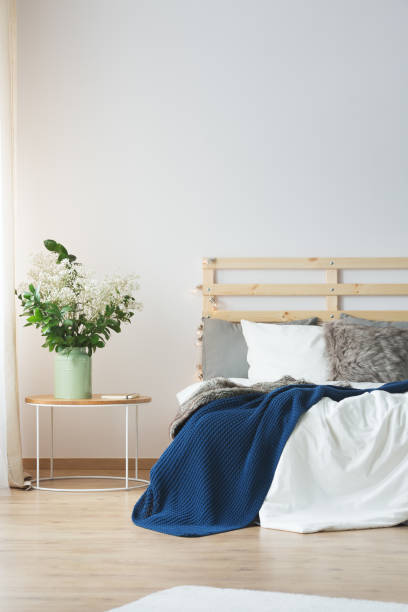 istock Flowers in bedroom 694447764