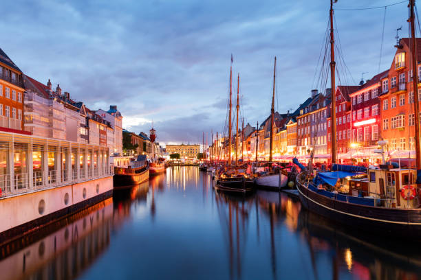 istock Summer sunset in Nyhaven, Copenhagen 694451082