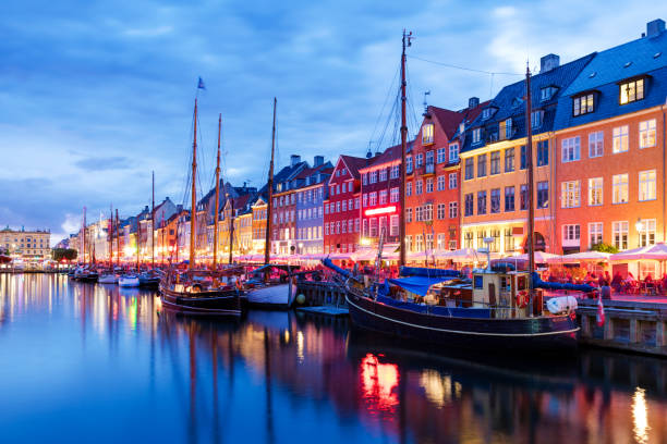 istock Summer sunset in Nyhaven, Copenhagen 694451086