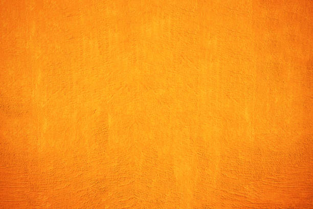 orange grunge hintergrund - orange wall textured paint stock-fotos und bilder