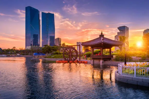 Traditional and modern architecture of seoul city in sunset, central park in songdo International business district, Incheon South Korea.