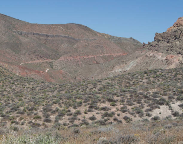istock Road through desert and mountains 694462098