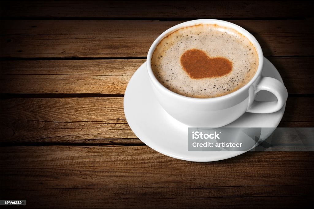 Coffee. Cup of coffee on wooden background Coffee - Drink Stock Photo