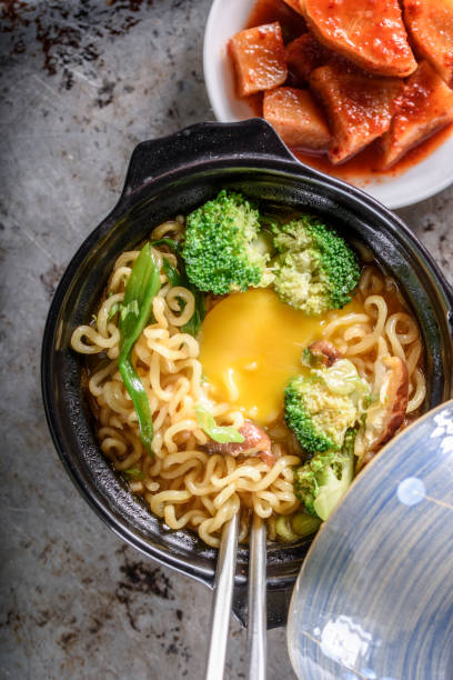 istock Ramen Noodle with Egg yolk and Broccoli 694468414