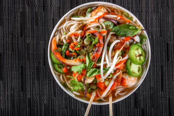 istock Pho, Vietnamese Soup Bowl, with seafood 694470090