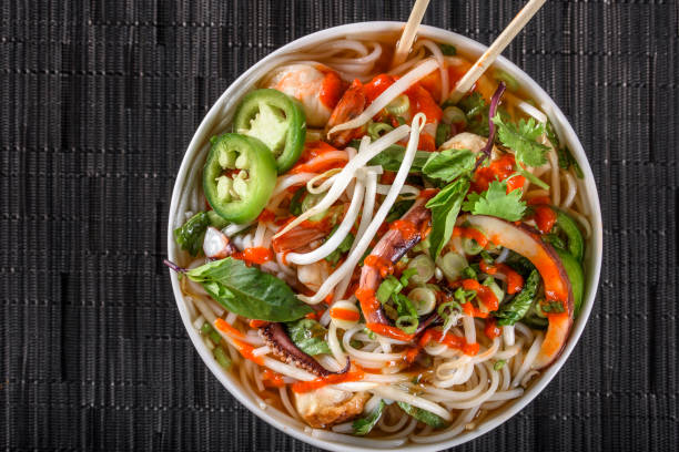 istock Pho, Vietnamese Soup Bowl, with seafood 694474448