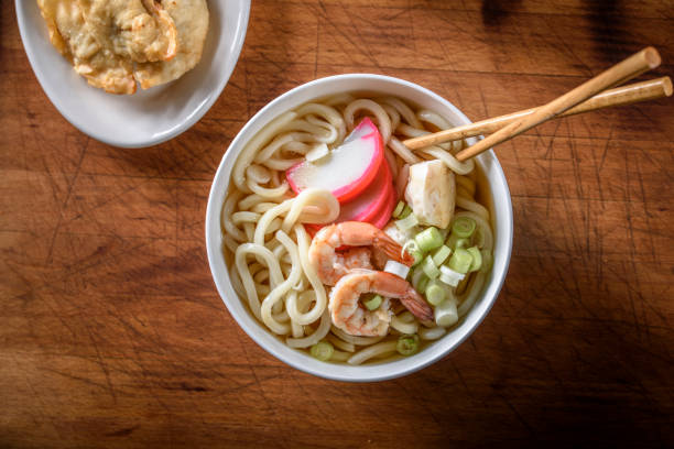 istock Udon, Japanese Noodle Soup, with Seafood 694474604