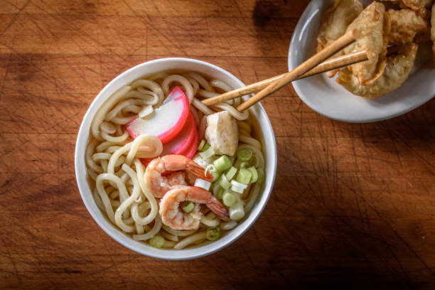 istock Udon, Japanese Noodle Soup, with Seafood 694474776