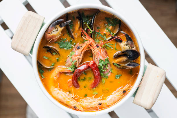istock mixed fresh creamy spicy seafood soup bowl 694477868