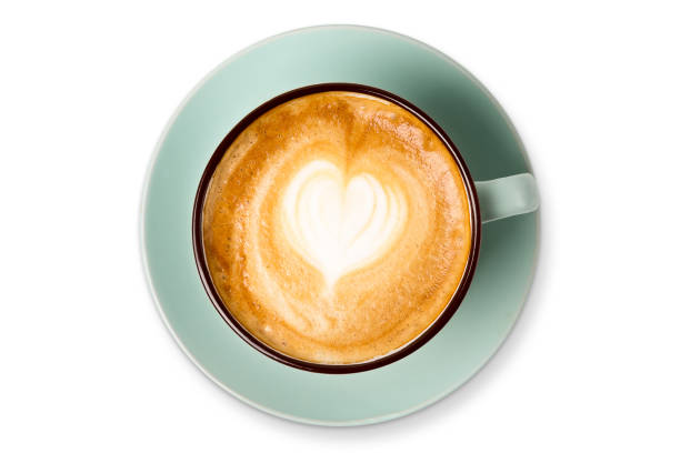 istock Cappuccino foam, coffee cup top view on white background 694485042