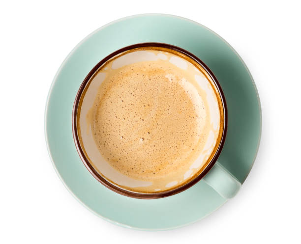 cappuccino foam, coffee cup top view on white background - latté imagens e fotografias de stock