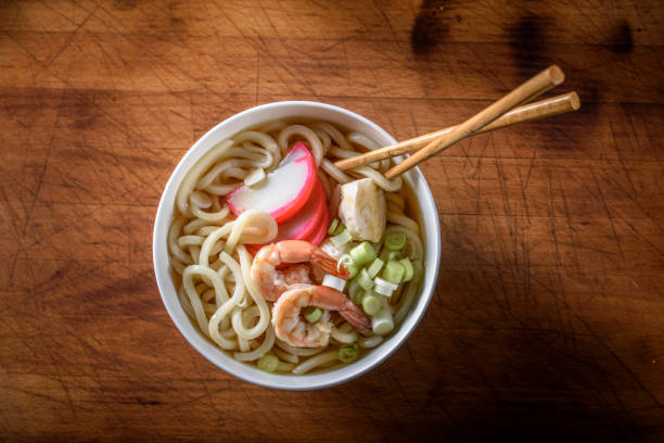 istock Udon, Japanese Noodle Soup, with Seafood 694485110