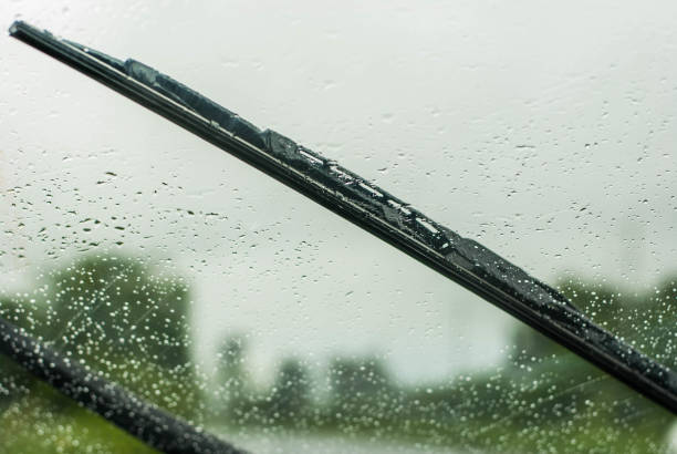 istock Heavy rain, blurry auto glass. traffic jam 694485656