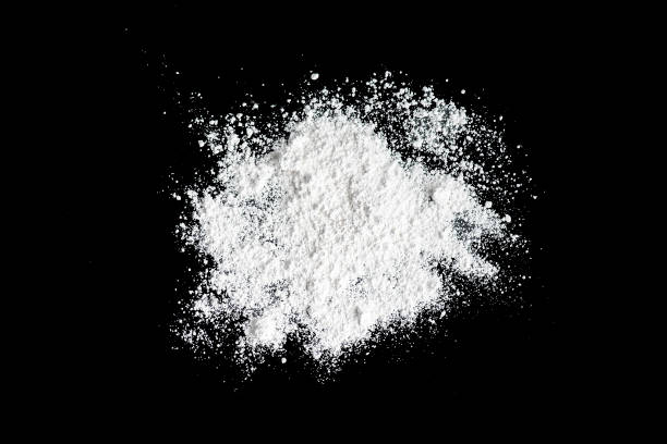 istock White powder on the black background 694489680