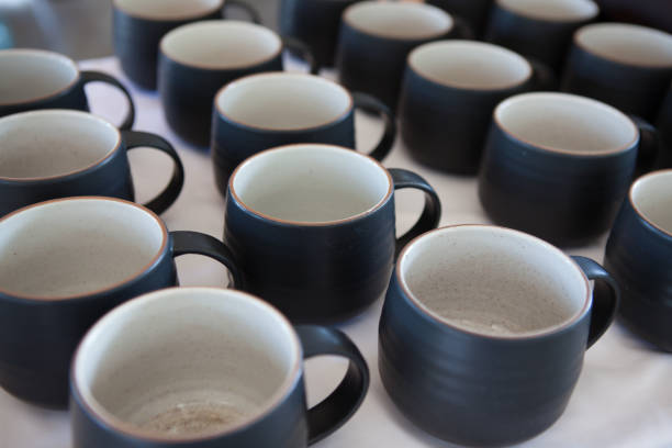 istock Selective focus a group of Black and white ceramic tea cups, Suitable for hot or cold drinks. 694495430