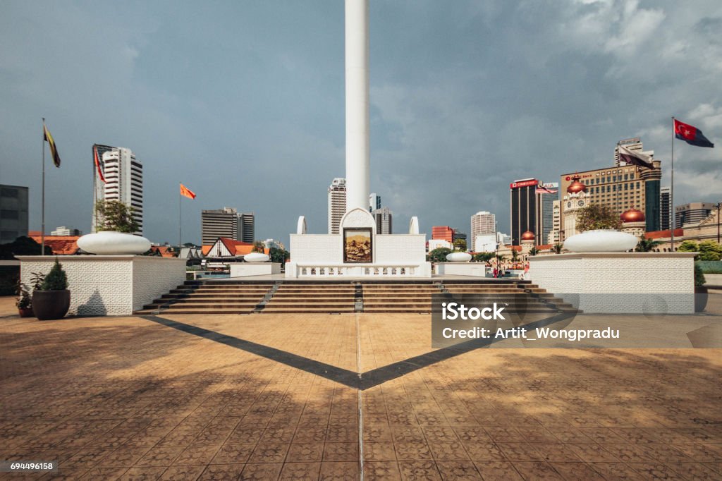 Base of The flag with cloudy sky in Kuala Lumpur, Malaysia. Dhahran Stock Photo