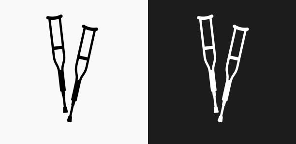 illustrazioni stock, clip art, cartoni animati e icone di tendenza di icona stampelle su sfondi vettoriali in bianco e nero - crutch