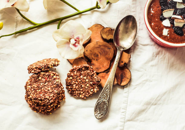 Chocolate gluten-free biscuit, with buckwheat, nuts, raw vegan dessert stock photo