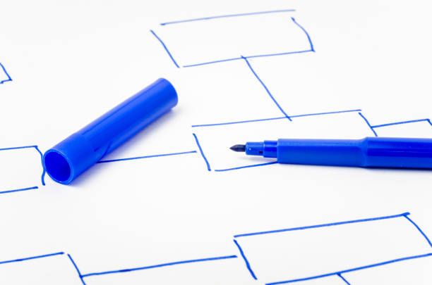 istock Blue Pen on a Sheet of Paper with a Diagram 694532466