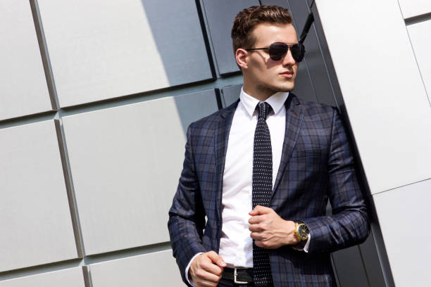istock fashionably dressed man in the background 694532846
