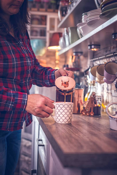 istock Preparing Fresh Coffee in Domestic Kitchen 694542546