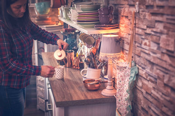 istock Preparing Fresh Coffee in Domestic Kitchen 694542620