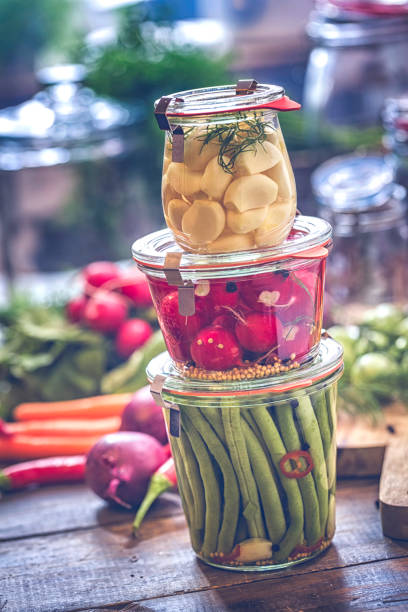 istock Preserving Organic Vegetables in Jars 694545902