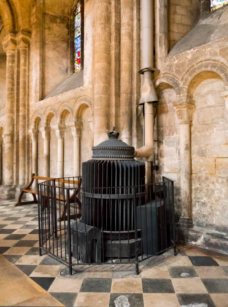 Victorian 'Gurney' warm-air stove in Ely Cathedral An old Victorian ‘Gurney’ warm-air stove, one of several in the side aisles of Ely Cathedral in Ely, Cambridgeshire. The stove was designed by Sir Goldsworthy Gurney during the 19th century. ely england photos stock pictures, royalty-free photos & images