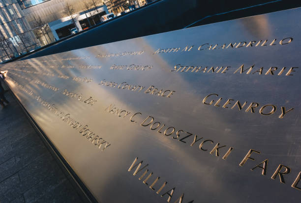 ground zero 9/11 memorial geometric architecture and buildings. the memorial honors people killed in the terror attacks of september 11, 2001 - osama bin laden imagens e fotografias de stock