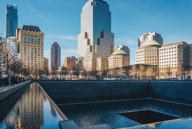 ground zero 9/11 memorial geometric architecture and buildings. the memorial honors people killed in the terror attacks of september 11, 2001 - osama bin laden imagens e fotografias de stock