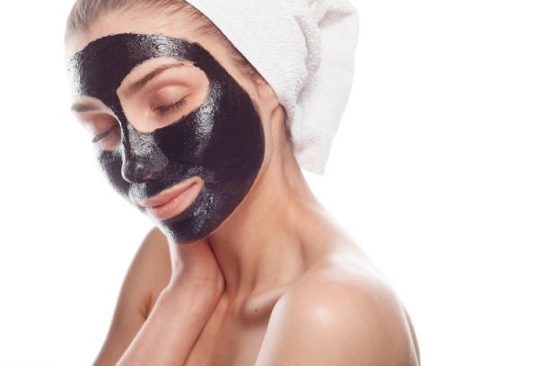 istock Woman pampering face skin 694555882