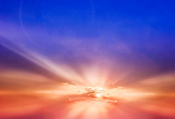 istock Colorful Sunset Sky of some Summer Evening with some silhouette . 694565622