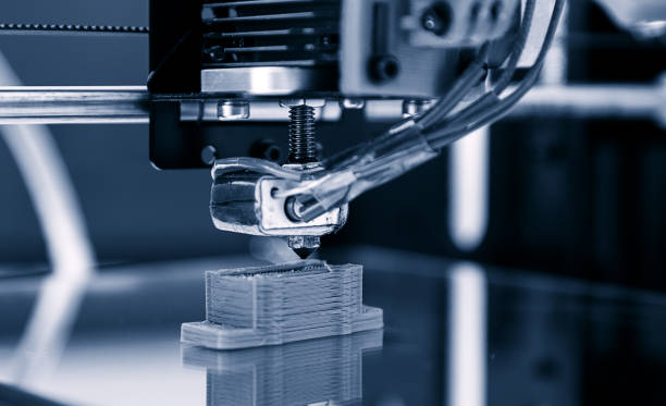 Electronic three dimensional plastic printer during work , 3D , printing. stock photo