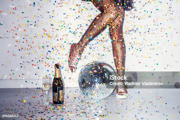 Party Detail With Woman Legs Stock Photo - Download Image Now - Party - Social Event, Nightclub, Disco Dancing