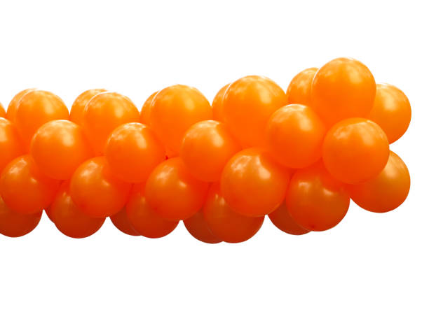 istock A bunch orange party balloons isolated 694569510