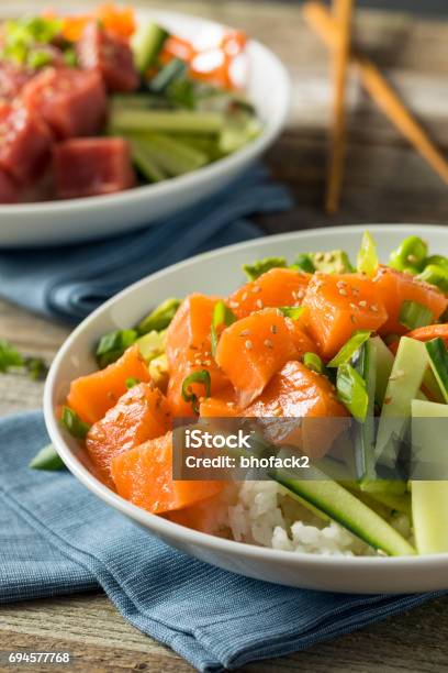 Raw Organic Salmon Poke Bowl Stock Photo - Download Image Now - Appetizer, Avocado, Bowl