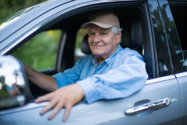 istock Senior man in a car 694578538
