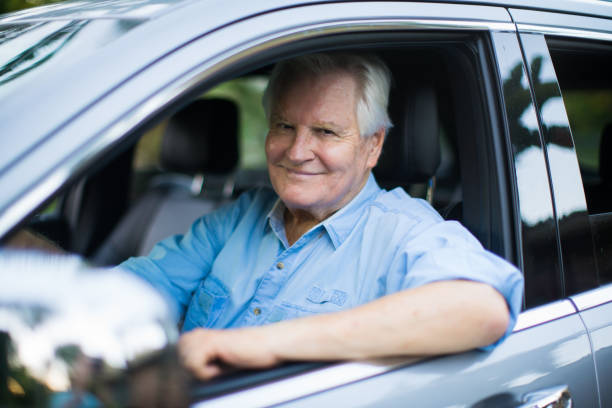 istock Senior man in a car 694584892