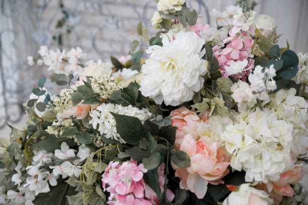 istock Flower arrangement of pions and hydrangeas. 694585042