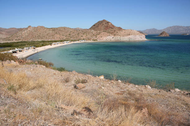 istock Remote camping on Playa Santispac, Baja California Sur, Mexico 694587980